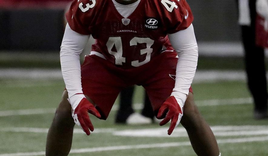 Arizona Cardinals first round draft pick Haason Reddick (43) runs drills during an NFL football minicamp, Tuesday, June 6, 2017, at the Cardinals' training facility in Tempe, Ariz. (AP Photo/Matt York)