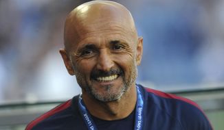 FILE - In this Wednesday, Aug. 17, 2016 coach Luciano Spalletti smiles during a Champions League play-offs first leg soccer match between FC Porto and AS Roma at the Dragao stadium in Porto, Portugal. Former Roma coach Luciano Spalletti said to reporters at Milan’s Malpensa airport Tuesday, June 6, 2017 he has reached a deal to become the new manager of Inter Milan.  (AP Photo/Paulo Duarte)