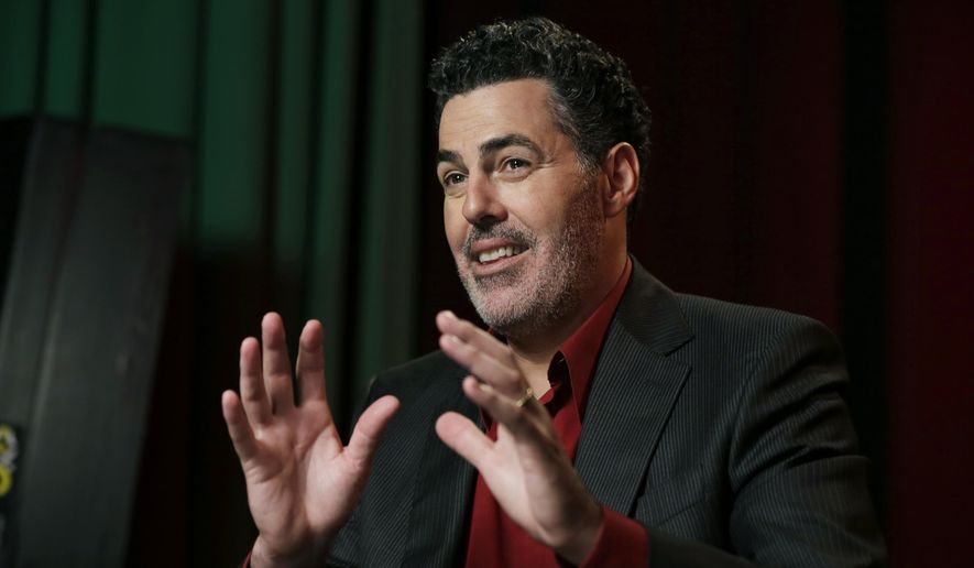 In this Thursday, May 28, 2015, photo, Adam Carolla speaks during and interview in New York. (AP Photo/Richard Drew) ** FILE **