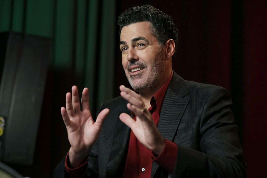 In this Thursday, May 28, 2015, photo, Adam Carolla speaks during and interview in New York. (AP Photo/Richard Drew) ** FILE **