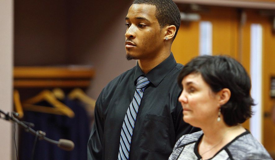 ADDS VANCE OF LAST NAME TO DEMETRIC - Former Michigan State football player Demetric Vance, left, and his attorney Mary Chartier appear in court, Tuesday, June 6, 2017, in East Lansing, Mich. Vance and two other Michigan State football players were charged Tuesday with criminal sexual conduct in connection with an incident that occurred on campus in January. (Mike Mulholland/The Grand Rapids Press via AP)