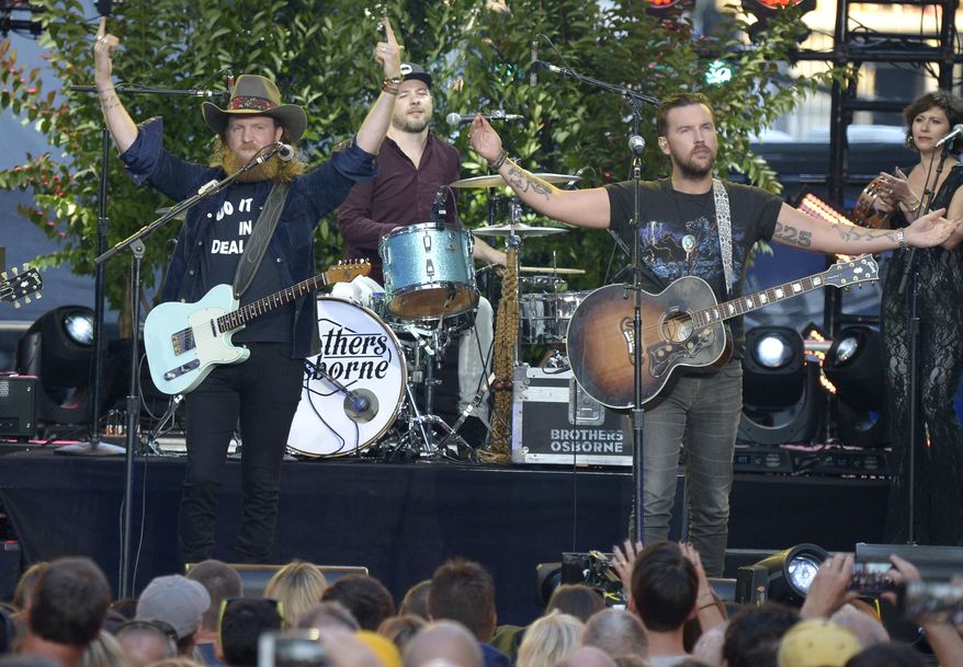 John Osborne, left, and T.J. Osborne, of Brothers Osborne, perform "It Ain't My Fault" at the CMT Music Awards at Music City Center on Wednesday, June 7, 2017, in Nashville, Tenn. (Photo by Amy Harris/Invision/AP)