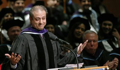 FILE- In this May 25, 2017 file photo, former U.S. Attorney Preet Bharara gestures as he tells how his music teacher told him he would never make it to Lincoln Center, as he addresses graduates and honorees during the 125th commencement exercises for New York Law School at Lincoln Center, in New York.  Bharara cultivated an image as a lawman who was above politics as Manhattan’s top federal prosecutor. In the three months since he was fired by President Trump, that image has been changing.  (AP Photo/Kathy Willens)