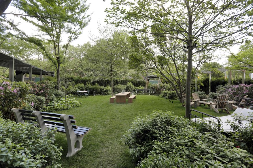 This June 1, 2017 photo shows the Chrystie Park garden at the PUBLIC hotel, in New York. The new hotel on Manhattan's Lower East Side opens Wednesday, June 7. It is the latest project from Ian Schrager, who's known for introducing the concept of boutique hotels and as co-founder of the legendary disco Studio 54. (AP Photo/Richard Drew)