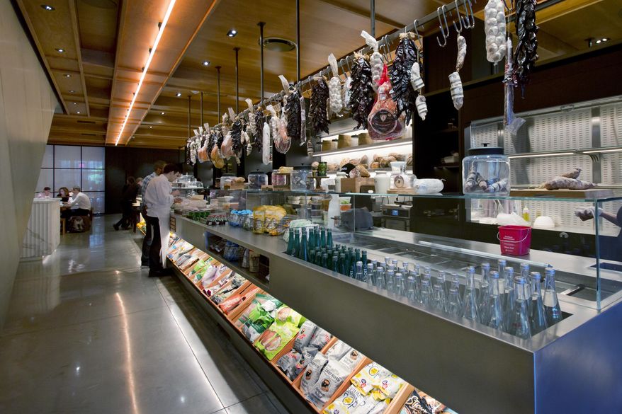 This June 1, 2017 photo shows food items are for sale in the Louis section of the lobby at the PUBLIC hotel, in New York. The new hotel on Manhattan's Lower East Side opens Wednesday, June 7. It is the latest project from Ian Schrager, who's known for introducing the concept of boutique hotels and as co-founder of the legendary disco Studio 54. (AP Photo/Richard Drew)