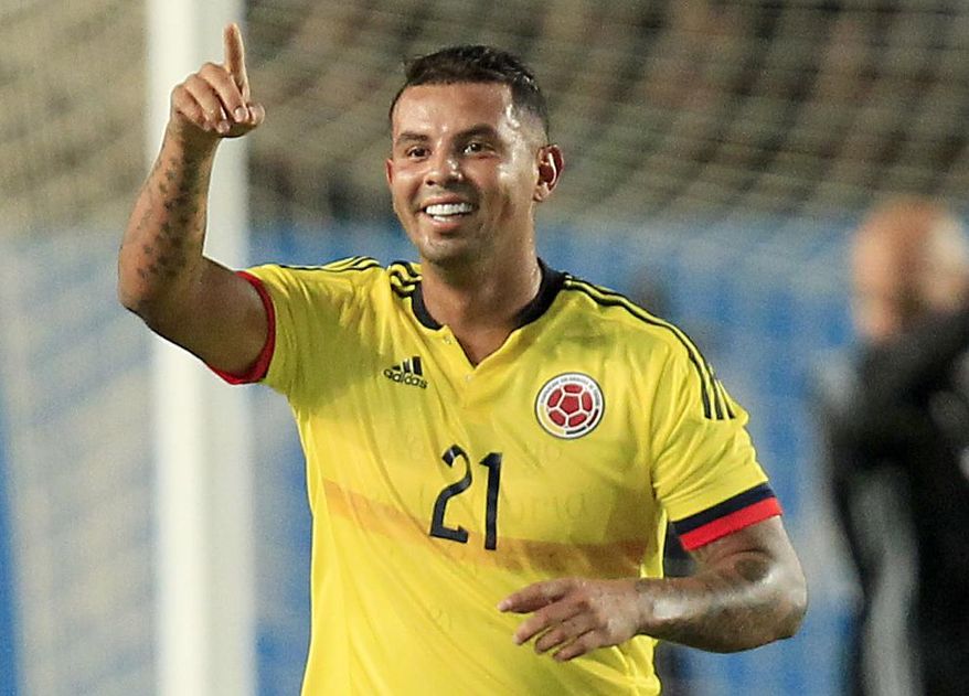 Colombia's Edwin Cardona celebrates after scoring against Spain during the international friendly soccer match between Spain and Colombia at the Estadio Nueva Condomina in Murcia, Spain, Wednesday, June 7, 2017. (AP Photo/Alberto Saiz)