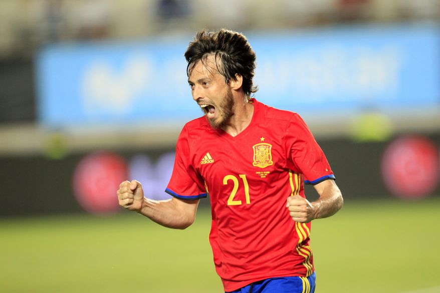 Spain's David Silva celebrates after scoring against Colombia during the international friendly soccer match between Spain and Colombia at the Estadio Nueva Condomina in Murcia, Spain, Wednesday, June 7, 2017. (AP Photo/Alberto Saiz)