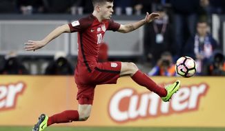 FILE - In this Friday, March 24, 2017, file photo, United States&#39; Christian Pulisic controls the ball during the first half of a World Cup qualifying soccer match against Honduras in San Jose, Calif. Pulisic is just 18, only he doesn&#39;t play like he&#39;s just 18. Already the youngest American to win a medal with a European club, Pulisic will now lead the U.S. into an important World Cup qualifier against Trinidad and Tobago on Thursday night, June 8. (AP Photo/Marcio Jose Sanchez, File)