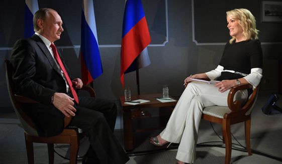 In this Saturday, June 3, 2017, photo released Monday, June 5, 2017, Russian President Vladimir Putin talks with Megyn Kelly during an interview with NBC&#39;s &amp;quot;Sunday Night with Megyn Kelly&amp;quot; in St. Petersburg, Russia. Putin says claims about Russian involvement in U.S. elections are untrue, and says the United States actively interferes with elections in other countries. (Alexei Druzhinin, Sputnik, Kremlin Pool Photo via AP)