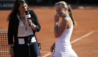 Latvia&#39;s Jelena Ostapenko answers a reporter after defeating Timea Bacsinszky of Switzerland during their semifinal match of the French Open tennis tournament at the Roland Garros stadium, Thursday, June 8, 2017 in Paris. (AP Photo/Michel Euler)
