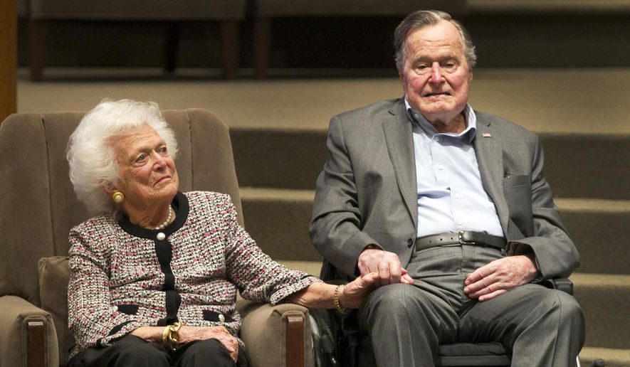 In this March 8, 2017, file photo, former President George H.W. Bush and former first lady Barbara Bush attend an awards ceremony hosted by Congregation Beth Israel after the Mensch International Foundation presented its annual Mensch Award to the former president in Houston. (Steve Gonzales/Houston Chronicle via AP, File)