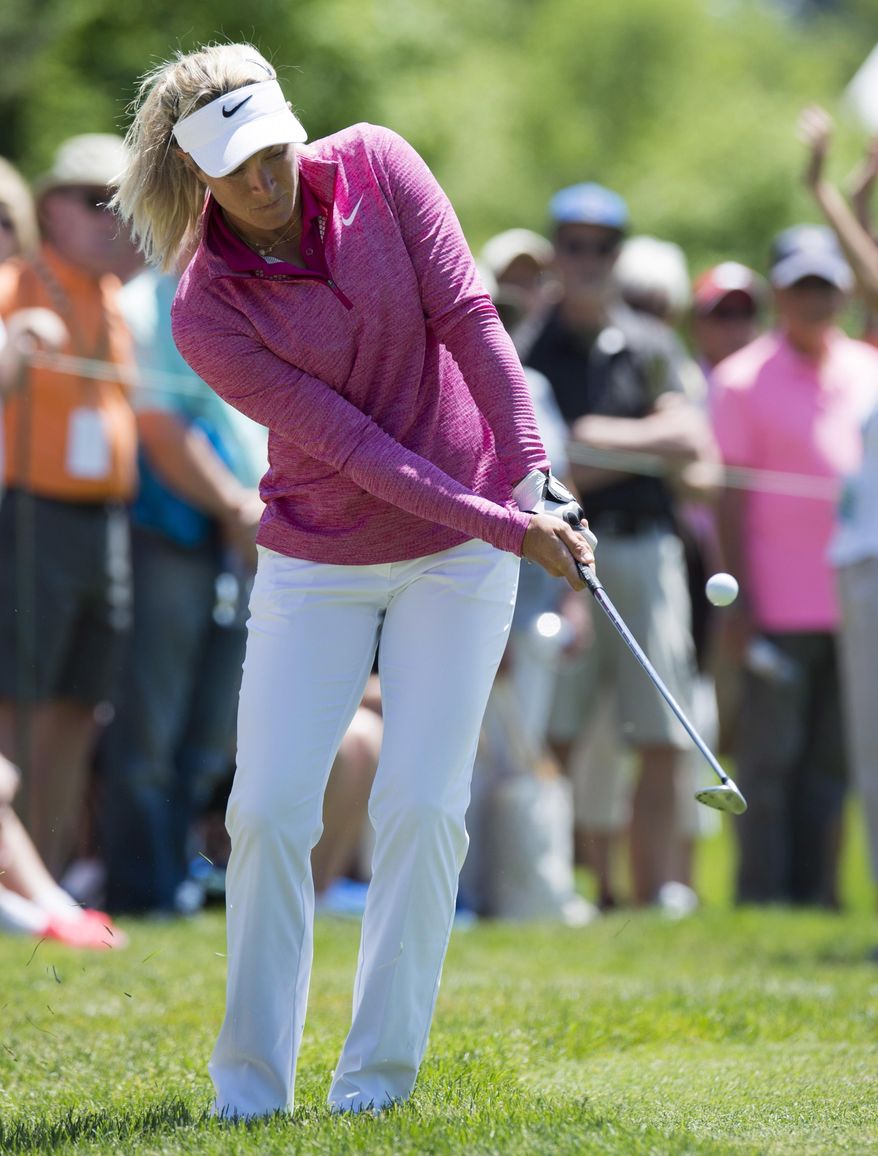 Suzann Pettersen, of Norway, chips onto the 16th green during the first round of the LPGA Classic golf tournament at Whistle Bear Golf Club in Cambridge, Ontario, Thursday, June 8, 2017. (Frank Gunn/The Canadian Press via AP)