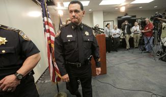 Harris County Sheriff Ed Gonzalez leaves a press conference, Thursday, June 8, 2017, in Houston. A Texas sheriff’s deputy and her husband were indicted Thursday on murder charges in the death of a man they restrained during a late night confrontation outside of a Houston-area restaurant. A Harris County grand jury in Houston returned the indictment against Harris County deputy Shauna Thompson and her husband, Terry Thompson, in the death of 24-year-old John Hernandez. Each could be sentenced to 5 to 99 years or life in prison if convicted. (Elizabeth Conley/Houston Chronicle via AP) ** FILE **