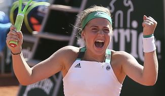 Latvia&#39;s Jelena Ostapenko celebrates her win over Timea Bacsinszky of Switzerland during their semifinal match of the French Open tennis tournament at the Roland Garros stadium, Thursday, June 8, 2017 in Paris. (AP Photo/David Vincent)