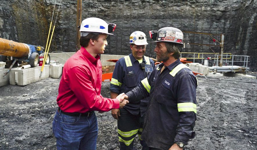 George Dethlefsen (lef), CEO of Corsa Coal Corp., said President Trump&#39;s deregulation effort had brought jobs back to the struggling coal economy in western Pennsylvania. Last week, Corsa opened its first new deep mine in Pennsylvania in six years. (Associated Press)