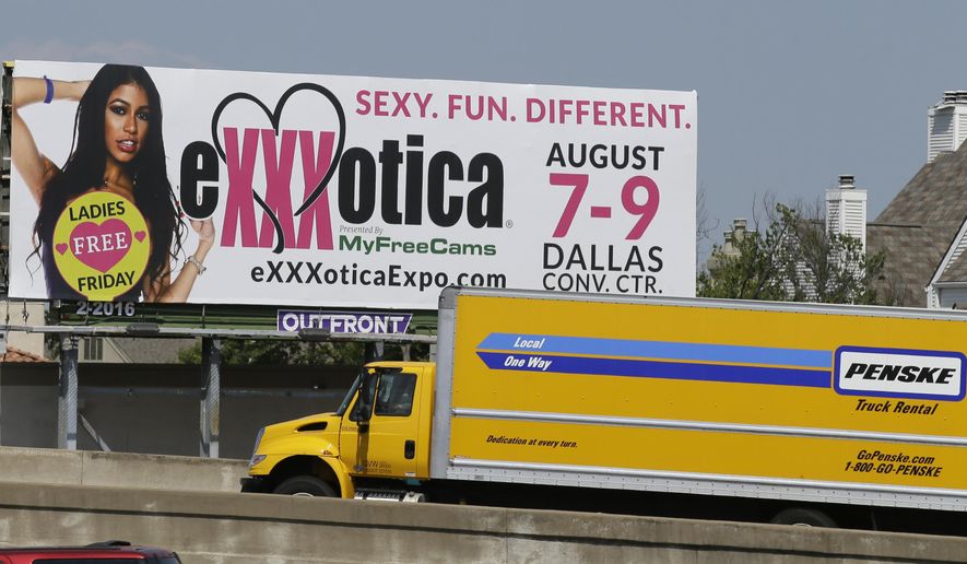 FILE - In this July 31, 2015 file photo, a billboard sign advertises the upcoming 2015 Exxxotica expo in Dallas. Lawyers for the sex exposition have filed a federal court appeal seeking to overturn a decision by Dallas officials to ban the expo from being held at a city-owned convention center in 2017. Exxxotica filed the appeal Tuesday June 6, 2017, with the 5th U.S. Circuit Court of Appeals less than a month after a federal judge dismissed its lawsuit against the city. (AP Photo/LM Oter, File)