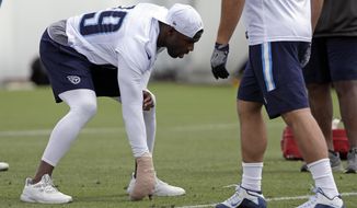Tennessee Titans running back DeMarco Murray wears a bandage on his right hand as he attends the team&#39;s organized team activity at its NFL football training facility Thursday, June 8, 2017, in Nashville, Tenn. (AP Photo/Mark Humphrey)
