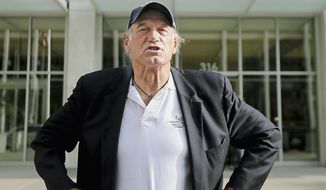In this Oct. 20, 2015, file photo, former Minnesota governor and professional wrestler Jesse Ventura talks to reporters outside the federal building in St. Paul, Minn. (Elizabeth Flores/Star Tribune via AP, File)