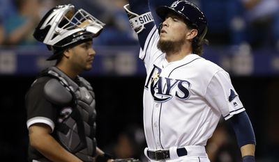 Tampa Bay Rays&#39; Colby Rasmus, right, celebrates in front of Chicago White Sox catcher Omar Narvaez after hitting a home run off relief pitcher Gregory Infante during the eighth inning of a baseball game Thursday, June 8, 2017, in St. Petersburg, Fla. (AP Photo/Chris O&#39;Meara)
