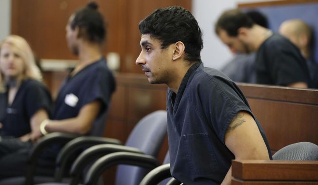 Jason Quate appears in court Friday, June 9, 2017, in Las Vegas. Quate has been is jailed in Las Vegas on suspicion of sex trafficking, a prostitution-related allegation and suspicion of child abuse. He is also under under investigation after his wife told police he killed their daughter and hid the body in an Illinois garage. (AP Photo/John Locher)