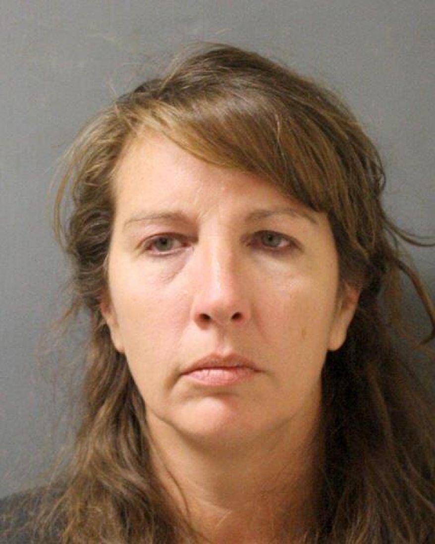 This undated photo provided by the Harris County Sheriff&#39;s Office shows the booking photo of Houston-area sheriff&#39;s deputy Chauna Thompson. The Harris County sheriff&#39;s office said Friday, June 9, 2017, that Thompson and her husband Terry Thompson have posted bail and that they have a court hearing scheduled for Tuesday, after they surrendered to authorities late Thursday after a grand jury that day handed up separate indictments against them. The Thompson&#39;s are accused of causing the May 28 death of 24-year-old John Hernandez outside a Houston-area restaurant. (Harris County Sheriff&#39;s Office via AP)