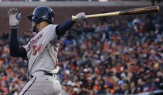 Minnesota Twins&#39; Ervin Santana follows through on a three-run double against the San Francisco Giants during the fourth inning of a baseball game in San Francisco, Friday, June 9, 2017. (AP Photo/Jeff Chiu)