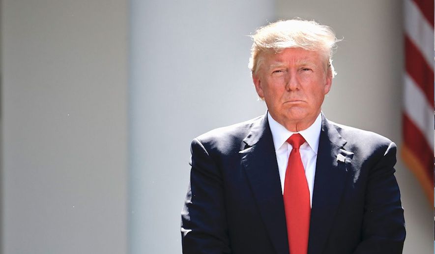 President Donald Trump — who has been more productive than his four White House predecessors according to a GOP report — stands in the Rose Garden earlier this month. (Associated Press) ** FILE **