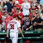 Fans salute Washington Nationals starting pitcher Max Scherzer after he is relieved in the eighth inning of Sunday&#39;s 5-1 loss to the Texas Rangers. (Associated Press Photographs)