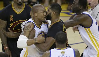 Cleveland Cavaliers center Tristan Thompson, center right, confronts Golden State Warriors forward David West during the first half of Game 5 of basketball&#39;s NBA Finals in Oakland, Calif., Monday, June 12, 2017. (AP Photo/Ben Margot)