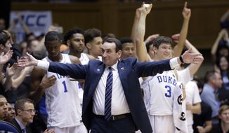 FILE - In this Thursday, Feb. 9, 2017, file photo, Duke coach Mike Krzyzewski reacts as time expires during the second half of the team&#39;s 86-78 win in an NCAA college basketball game against North Carolina, in Durham, N.C. Duke athletic director Kevin White is looking forward to a better, and healthier, 2017-18 for all of his school’s athletic teams. In fact, Hall of Fame men’s basketball coach Mike Krzyzewski missed a month after having back surgery, and three freshman forwards each missed significant time with knee, foot and ankle injuries. (AP Photo/Gerry Broome, File)
