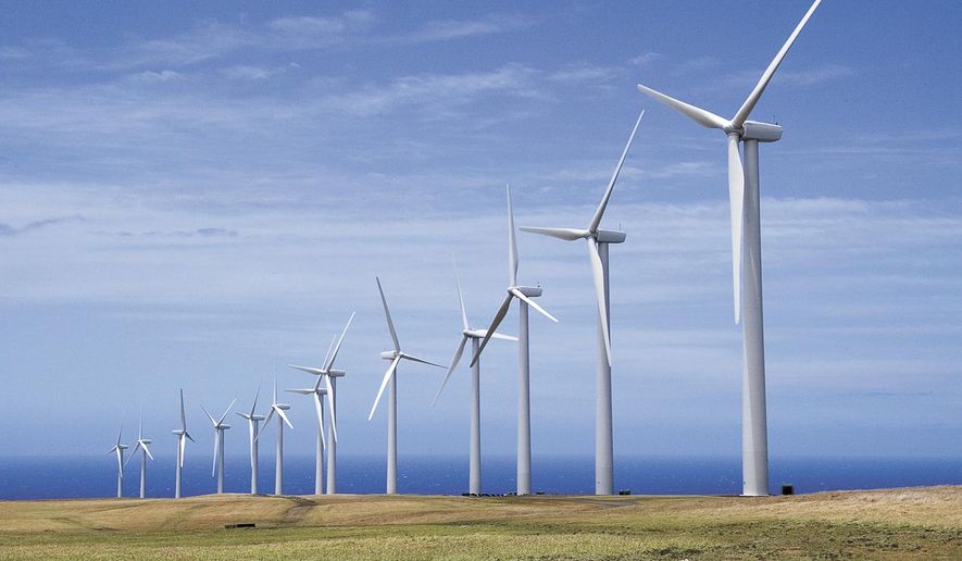 In this July 12, 2007, file photo, General Electric wind turbines, part of the Pakini Nui Wind Farm project are seen in Kailua-kona, Hawaii. (Michael Darden/West Hawaii Today via AP, File)