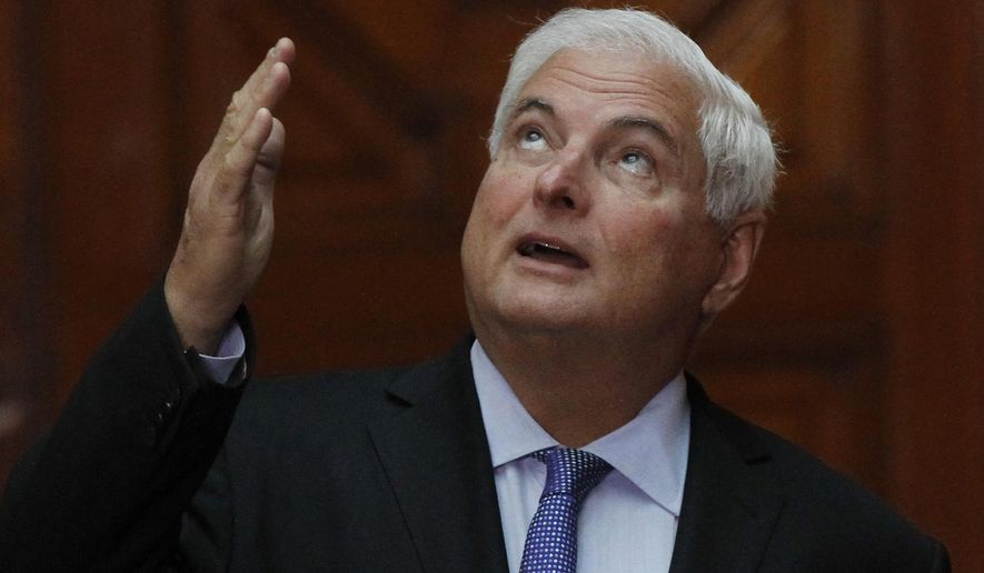 FILE.- In this March 24, 2017 file photo, Panama&#39;s President Ricardo Martinelli gestures during a meeting with Mexico&#39;s President Enrique Pena Nieto in Mexico City, Monday, March 24, 2014.  U.S. authorities have arrested Monday June 12, 2017 former Panamanian President Ricardo Martinelli on an extradition warrant from his country. U.S. Marshals Service spokesman Manny Puri says Martinelli was in custody Monday evening at a federal detention center in Miami. He is accused of corruption and spying on opponents in Panama. (AP Photo/Marco Ugarte, File)