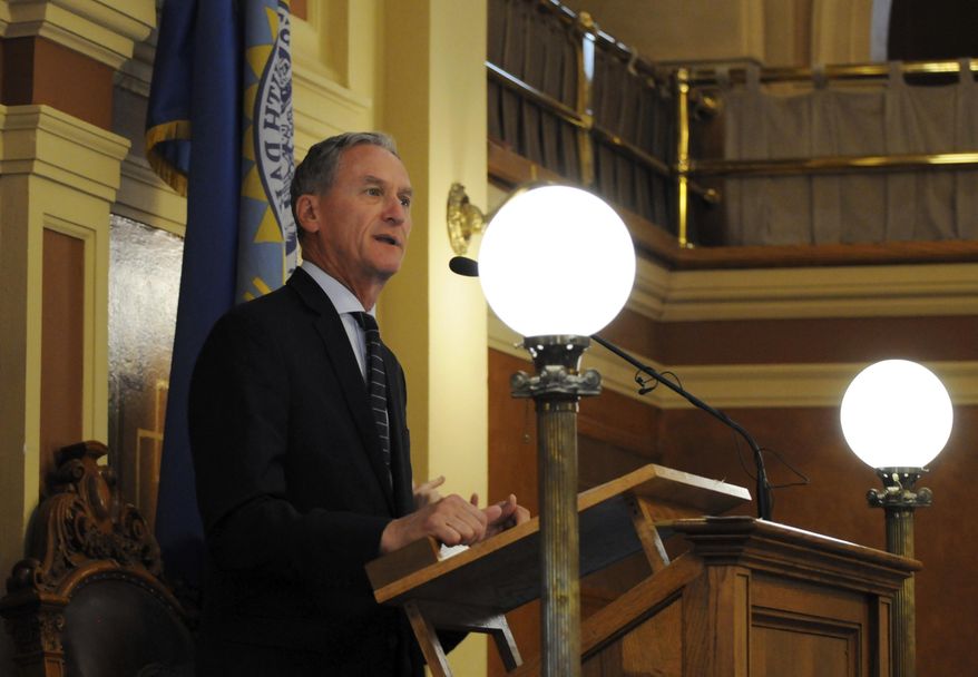 Gov. Dennis Daugaard gives a speech to lawmakers at the state Capitol in Pierre, S.D., Monday, June 12, 2017. The governor urged legislators to approve a bill that would create rules governing the use of lakes on private land for recreation. (AP Photo/James Nord)