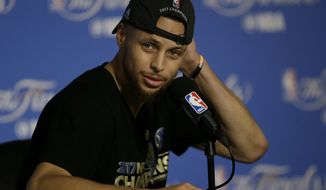 Golden State Warriors guard Stephen Curry speaks at a news conference after Game 5 of basketball&#39;s NBA Finals between the Warriors and the Cleveland Cavaliers in Oakland, Calif., Monday, June 12, 2017. The Warriors won 129-120 to win the NBA championship. (AP Photo/Ben Margot)