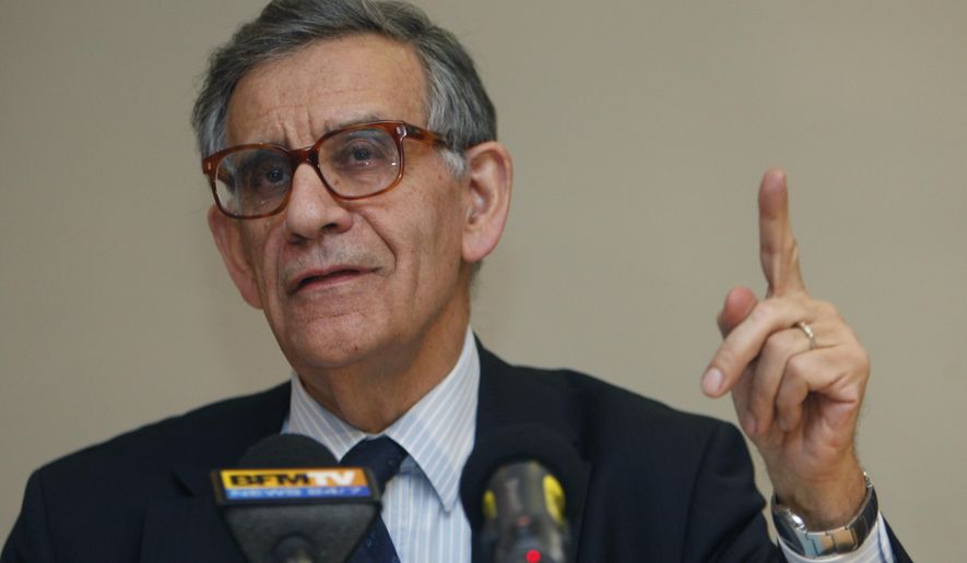 FILE - This is a Thursday, Nov. 18, 2010 file photo of the newly named president of the French Anti-Doping Agency Bruno Genevois, as he gestures while he speaks to reporters during a press conference in Paris.French anti-doping officials are worried about the increased use of cocaine by athletes to enhance their performance. (AP Photo/Michel Euler, File)