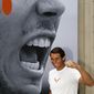 Spain&#39;s Rafael Nadal poses for photos as part of a promotional event on the Champs Elysees avenue in Paris, France, Monday, June 12, 2017. Nadal defeated Switzerland&#39;s Stan Wawrinka in the men&#39;s final at the French Open tennis championships on Sunday.(AP Photo/Francois Mori)