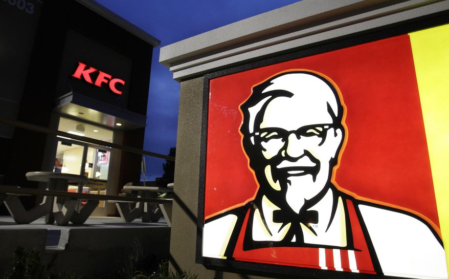 FILE - This April 18, 2011, file photo shows a KFC restaurant in Mountain View, Calif. KFC announced on June 13, 2017, that it plans to send a chicken sandwich to the edge of the atmosphere with the help of a high-altitude balloon. (AP Photo/Paul Sakuma, File)