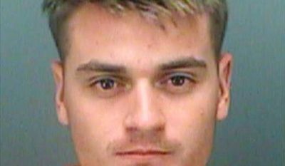 This June 7, 2017 photo provided by the Pinellas County Sheriff&#x27;s Office shows Brandon Russell, 21. Russell, a self-proclaimed neo-Nazi arrested after agents found bomb-making materials in his Florida apartment while investigating the slayings of his two roommates, planned to use the explosives to harm civilians, nuclear facilities and synagogues, federal prosecutors said. (Pinellas County Sheriff&#x27;s Office via AP)