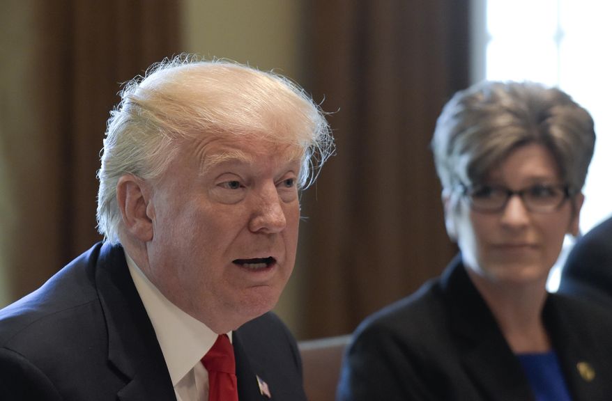 Sen. Joni Ernst, R-Iowa listen at right as President Donald Trump speaks in the Cabinet Room of the White House in Washington, Tuesday, June 13, 2017, before having lunch with Republican senators. (AP Photo/Susan Walsh) ** FILE **