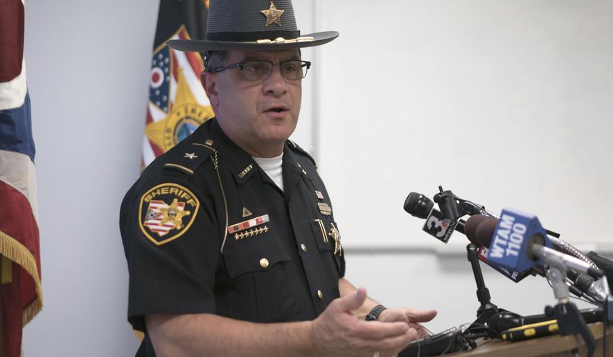 Stark County Sheriff George T. Maier speaks to reporters in Canton, Ohio on Tuesday, June 13, 2017. Maier said the same man, George Brinkman Jr., is the suspect in the killing of a mother and her two college-age daughters and a married couple in another city in northeastern Ohio. (AP Photo/Dake Kang)