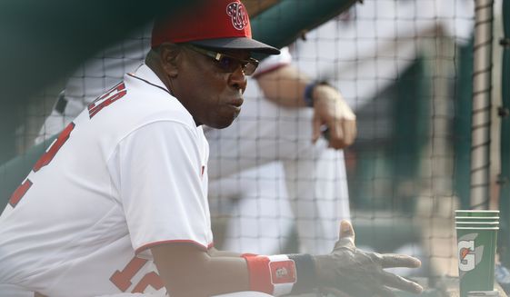 Washington Nationals manager Dusty Baker watches from the dugout during the seventh inning of the team&#39;s baseball game against the Atlanta Braves at Nationals Park, Wednesday, June 14, 2017, in Washington. The Braves won 13-2. (AP Photo/Carolyn Kaster)