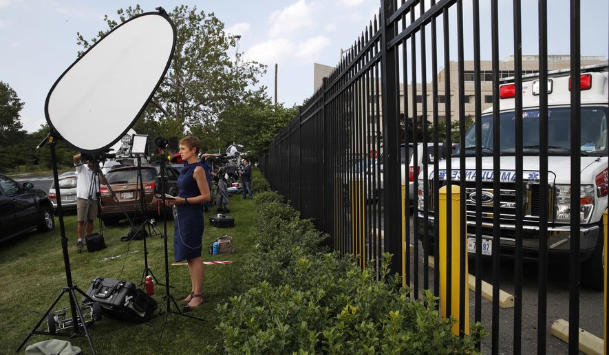 Television crews line the emergency entrance at MedStar Washington Hospital Center in Washington, Wednesday, June 14, 2017, where House Majority Whip Steve Scalise of La. was taken after being shot in Alexandria, Va., during a Congressional baseball practice. (AP Photo/Jacquelyn Martin)