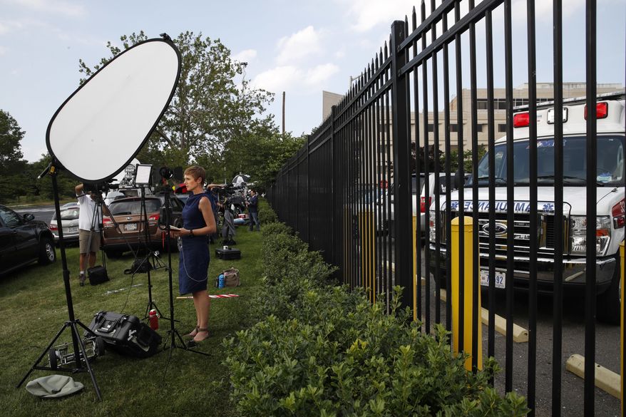 Television crews line the emergency entrance at MedStar Washington Hospital Center in Washington, Wednesday, June 14, 2017, where House Majority Whip Steve Scalise of La. was taken after being shot in Alexandria, Va., during a Congressional baseball practice. (AP Photo/Jacquelyn Martin)