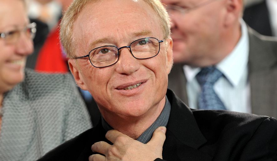 FILE - In this Oct. 10, 2010 file photo, Israeli author and journalist David Grossman reacts after receiving the peace prize of the German booktrade, in Frankfurt, Germany. Grossman has won the Man Booker International Prize for his novel “A Horse Walks Into a Bar.” The award was announced Wednesday, June 14, 2017, in London. (AP Photo/dapd, Thomas Lohnes, File)