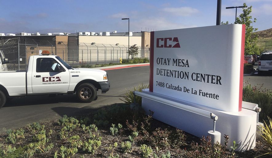FILE - In this June 9, 2017, file photo, a vehicle drives into the Otay Mesa detention center in San Diego, Calif. California is poised to deal a strong blow to immigration detention in the state as lawmakers seek new ways to push back against the Trump administration's plans to deport more people. The state's $125 billion budget set to be approved on Thursday, June 15, 2017 would prevent local governments from signing contracts with federal immigration authorities for detention facilities or expanding existing contracts like one underway in Orange County. It is the latest in a series of moves by California lawmakers aimed at protecting immigrants from Trump's plans to step up deportations. (AP Photo/Elliot Spagat, File)