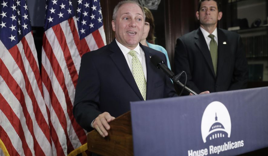 In a photo from Tuesday, June 13, 2017, House Majority Whip Steve Scalise, R-La., joined by Speaker of the House Paul Ryan, R-Wis., far right, and Rep. Cathy McMorris Rodgers, R-Wash., comments on health care for veterans during a news conference at Republican National Committee Headquarters on Capitol Hill in Washington. (AP Photo/J. Scott Applewhite)
