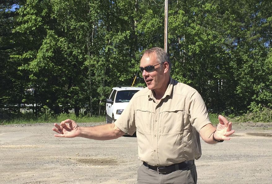U.S. Interior Secretary Ryan Zinke talks with reporters before touring Katahdin Woods and Waters National Monument Wednesday, June 14, 2017 in Medway, Maine. Katahdin Woods and Waters National Monument is one of more than a dozen that's under review by President Trump. (AP Photo/Patrick Whittle)