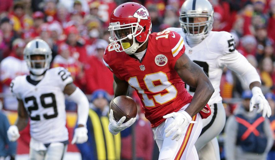 FILE - In this Jan. 3, 2016, file photo, Kansas City Chiefs wide receiver Jeremy Maclin (19) runs away from Oakland Raiders cornerback David Amerson (29) and defensive end Khalil Mack (52) during the first half of an NFL football game in Kansas City, Mo. Although the standout receiver put up lesser numbers last year than in 2015, Maclin had no indication he was about to be the victim of a salary-cap cut, especially after participating in offseason training activities with the Chiefs. Turns out, several NFL teams were interested in giving him a job. Baltimore proved to be the best fit, and Maclin happily signed a two-year deal on Monday, June 12, 2017. (AP Photo/Charlie Riedel, File)