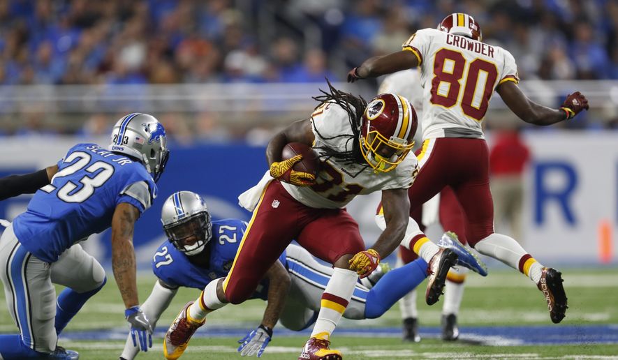 In this photo taken Oct. 23, 2016, Washington Redskins running back Matt Jones (31) rushes during the first half of an NFL football game against the Detroit Lions in Detroit. The agent for Jones hopes the Washington Redskins release the former starting running back sooner rather than later. (AP Photo/Paul Sancya)