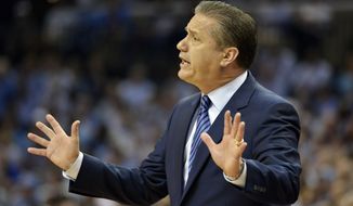 FILE - In this March 26, 2017, file photo, Kentucky coach John Calipari gestures during the first half of the South Regional final against North Carolina in the NCAA college basketball tournament in Memphis, Tenn. When Calipari leads the U.S. men into the under-19 world basketball championship, they will travel to Egypt, home to enough violence lately that the Americans questioned whether it was safe enough to even go defend their title. Gen. Martin Dempsey, the former Chairman of the Joint Chiefs of Staff, is now USA Basketball’s chairman, and a conversation a few weeks ago that detailed the Americans’ security plans and procedures put Calipari’s mind at ease. (AP Photo/Brandon Dill, File)